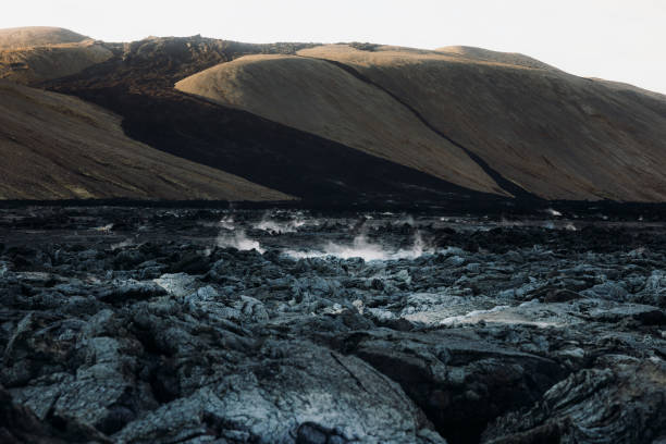 Scenic view of black textured fleshed smoked lava of the last eruptions on Reykjanes peninsula during summer sunset