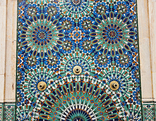 istock beautiful Moroccan Colorful zellige tiles pattern - Mosaic pattern, traditional Islamic Moroccan geometric design in the Exterior of Hassan II Mosque w 2205234262