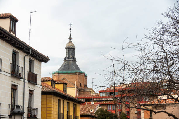 istock A church tower can be seen positioned between two structures in a city 2205235125