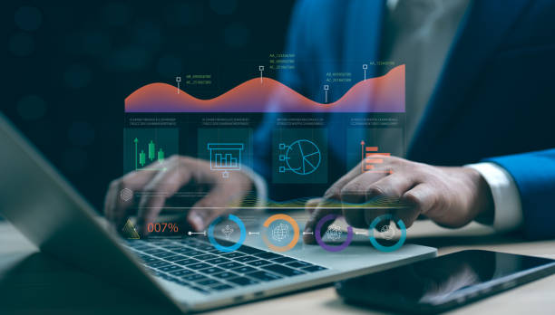 istock Businessman analyst data management system on laptop. Corporate strategy for finance, operations, sales and marketing, make a report with KPI and metrics connected to database. 2205235722