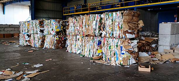 istock Bales Plastic and cardboard collected to be recycled for new use 2205239282