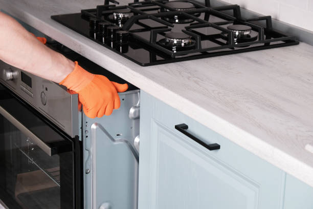 istock Process of installing an electric oven in  kitchen 2205242453