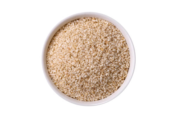 istock White sesame seeds in a bowl, an ingredient for making vegetarian food 2205244678