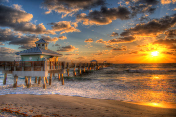 istock Juno Beach Fishing Pier Boardwalk at Sunrise, Jupiter, Juno Florida. 2205247807