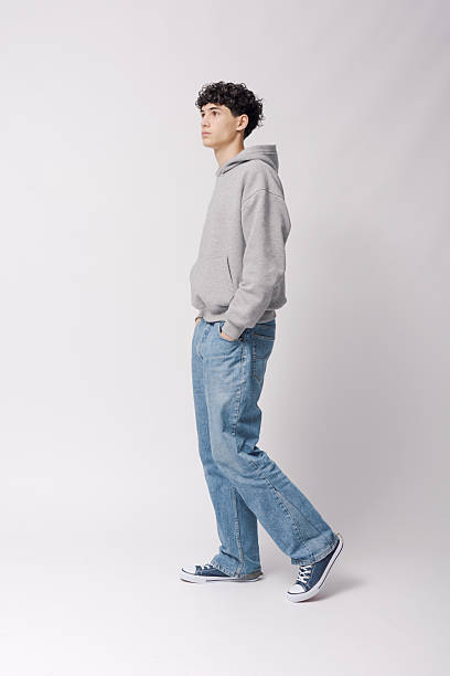 istock Teenager walking and looking forward 2205249474