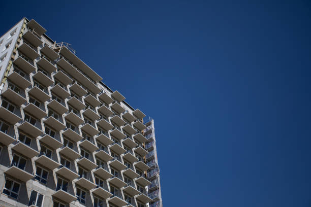 istock The Innovative Modern Architectural Design is Beautifully Set Against a Clear, Bright Blue Sky 2205253168