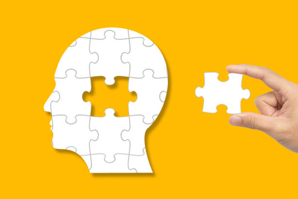 istock Connecting last missing piece of the brain puzzle. Mental health and problems with memory. 2205268340