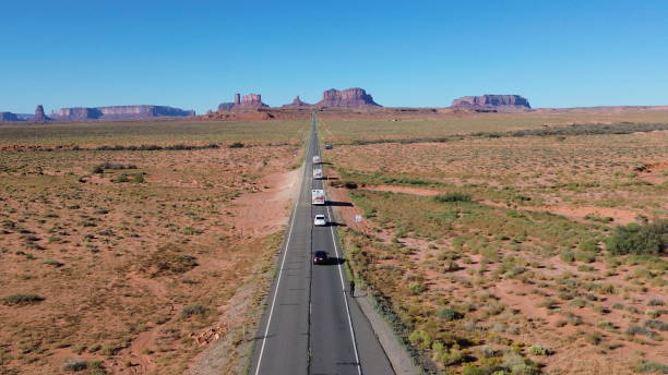 istock Aerial view of camper on desert road 2205272949