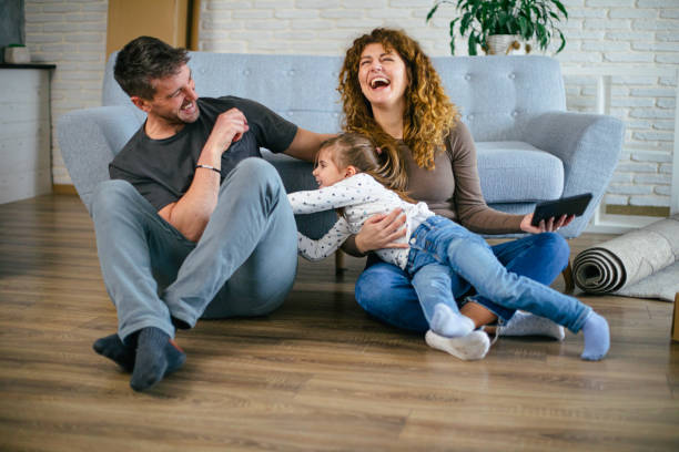 istock Happy family in a new home 2205275514