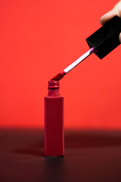 istock Lip Gloss with Pinkish-Red Shade On matching background 2205286132