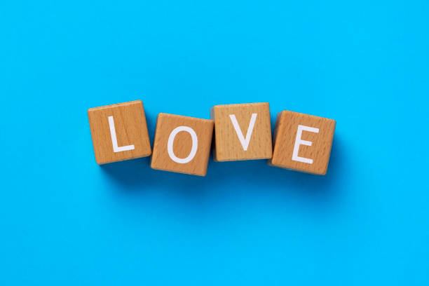 istock Block Words with Love on a Blue Background 2205289845