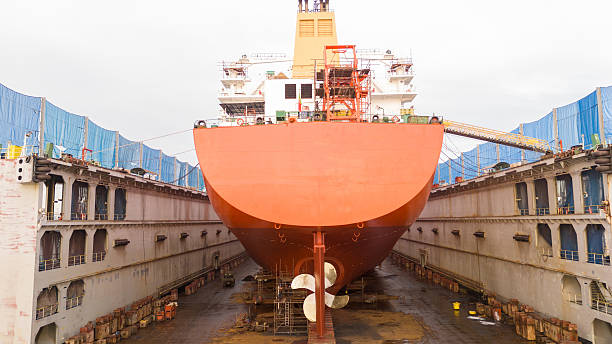 istock Propeller of large ship spinning power working and water splash contrail . Close up image detail Stern back of Vessel ship, Logistics Transportation industry express technology Freight. 2205294881