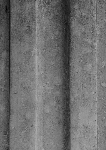 istock Black and white background of a container weathered and mossed wall. Vertical photo. 2205300573