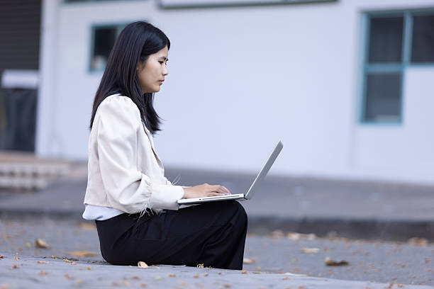istock Future remote work combines technology smart phone connection online white digital business woman enable e-learning productivity while travel blend comfort modern devices serenity computer equipment 2205300604