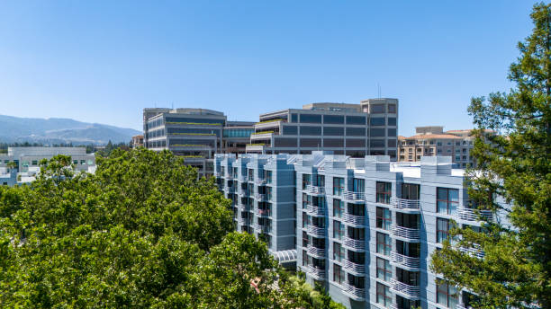 istock Architecture boom transforms Cupertino, California. Multi story apartment complex emerges in tech-centric cityscape 2205303410