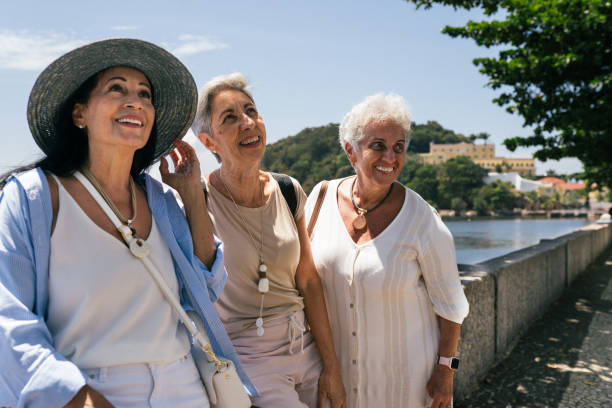 istock Smiling ladies gathered for a picture at Urca in Rio de Janeiro Brazil 2205304607