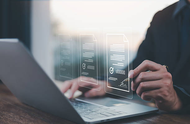 istock Electronic signature Businessman signs electronic document on digital document on page Electronic signature concept Writing business 2205305517