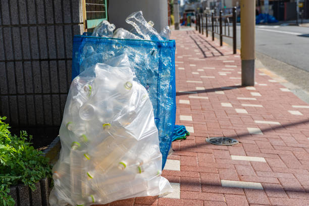 istock Collected PET bottles on garbage day 2205308322