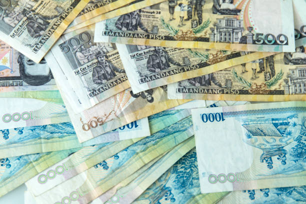 istock banknotes of Philippines PESO 2205311152