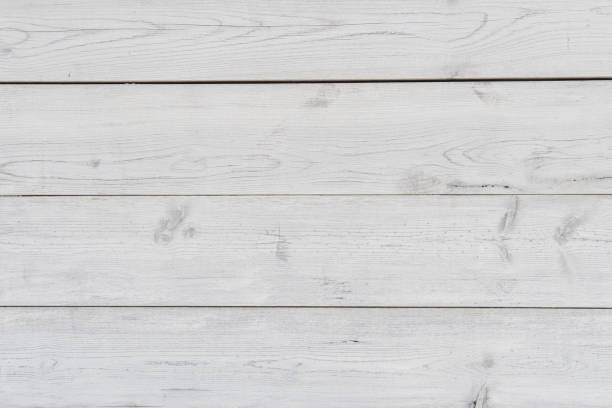 istock A wooden wall made of white boards arranged horizontally 2205311526