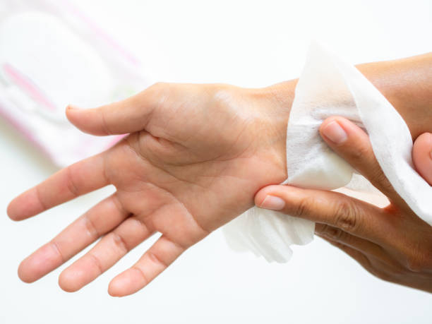 istock Hand woman holding wet wipe 2205313233
