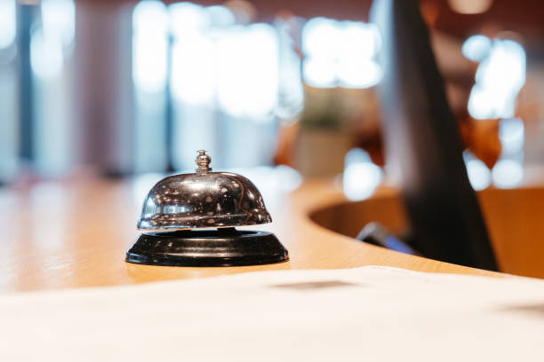 istock A shiny call bell inviting interaction and symbolizing immediate assistance beckons from a warm wood surface 2205314257