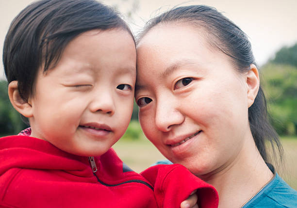 Happy Asian mother and son