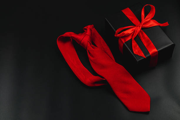 istock Celebrate Father's Day with a Special Gift and Classic Red Tie 2205321375