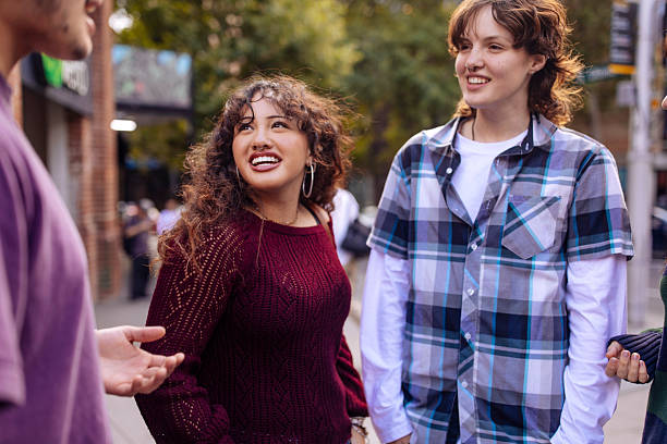 istock Friends on a street 2205322225