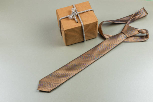 Creative father's day gift idea featuring a tie and wrapped present