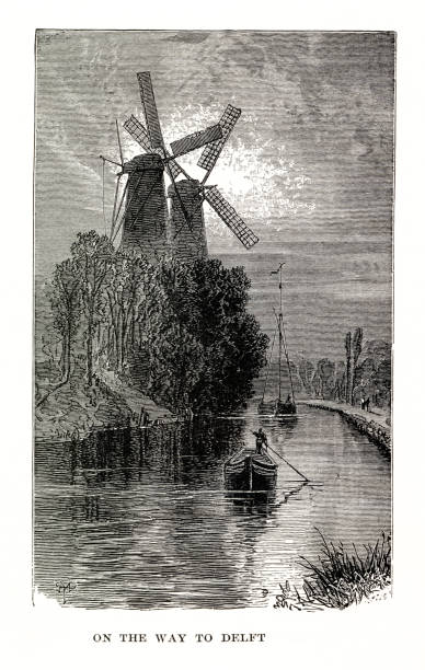 istock woodcut of windmills along Vliet canal 2205325164