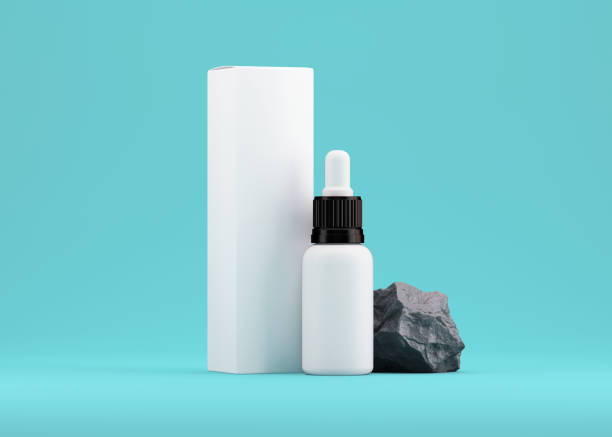 Blank Face Serum Bottle With Black Cover and White Package Mockup