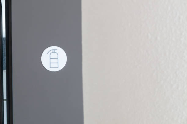 istock Fire Safety Sign on Wall Indicating Emergency Equipment Location 2205325918