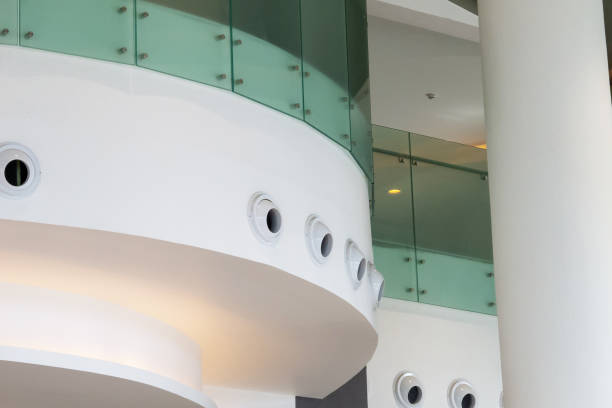 istock Modern Architectural Design Featuring Curved White Surfaces and Glass 2205325927
