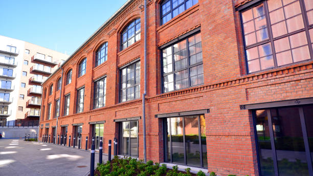 istock Modern loft building from red brick in downtown area. 2205327913