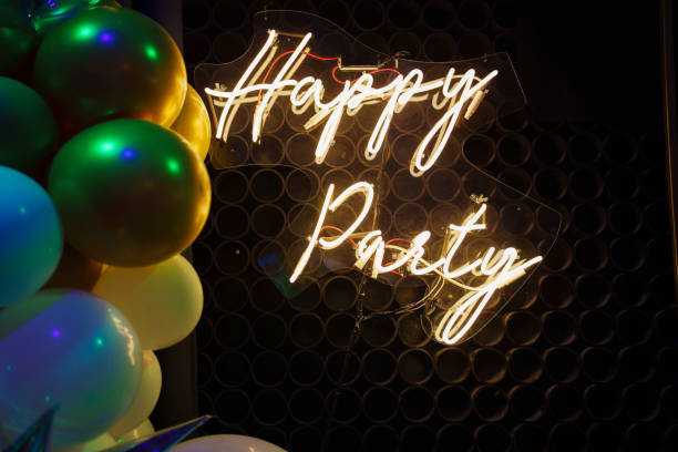istock Happy Birthday Lettering LED Strip Light on Black Background 2205331093