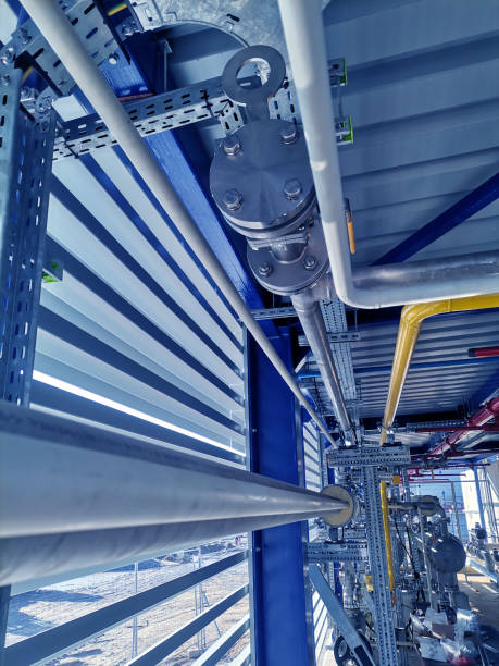 istock Steel structure is under construction on the construction site against a blue sky backdrop 2205334824