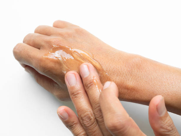 istock Woman apply cream moisture body hand 2205336486