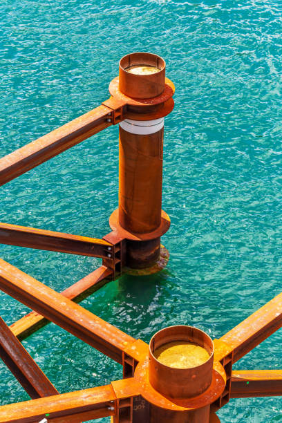 Rusty Steel Beams Over Blue Water