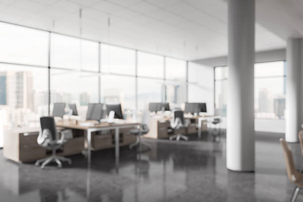 istock Modern office interior with large windows and city view. 3D Rendering 2205341652