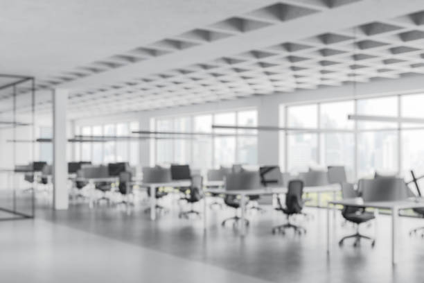 istock Modern Office Interior with Desks and Chairs in Blurred Style. 3D Rendering 2205342047