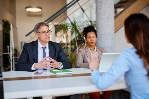 istock Businesspeople interviewing a candidate during a job interview 2205342068