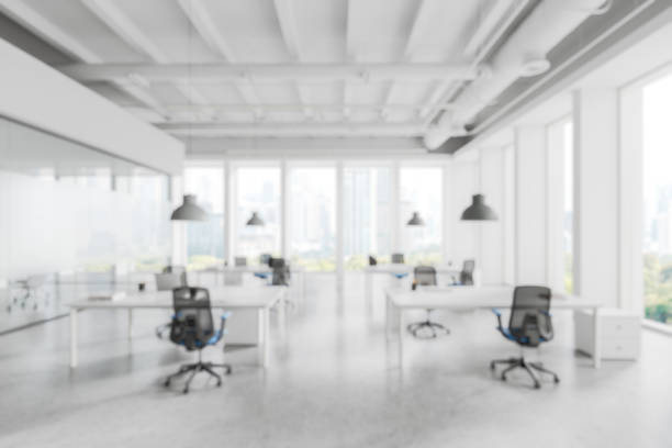 istock Modern Office Interior with Desks and Chairs in Blurred Design. 3D Rendering 2205342348