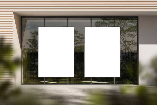 istock Blank poster mockup on modern building glass facade for advertising display. 3D Rendering 2205342470