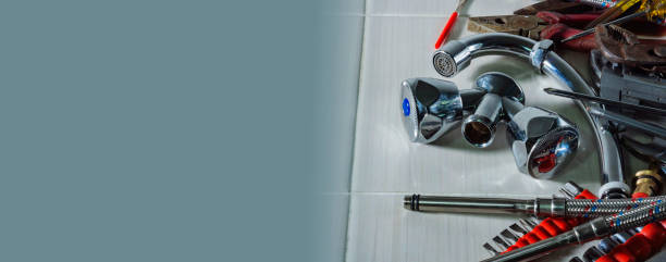 istock A set of plumbing tools for repairs 2205345154