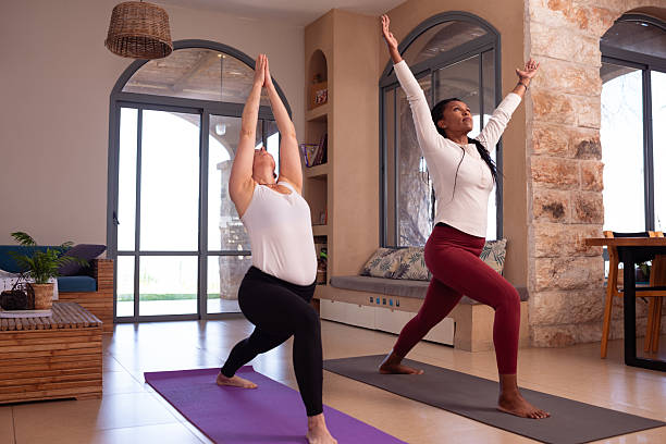 istock Focused Yoga Practice in a Stylish Indoor Setting. 2205346249
