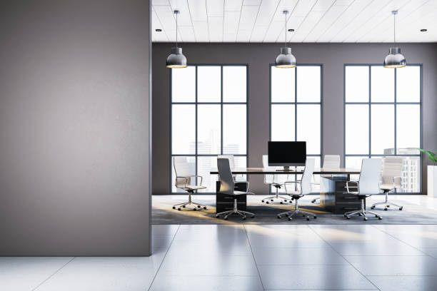 istock Modern office interior with empty gray wall and conference room. 3D Rendering 2205348674