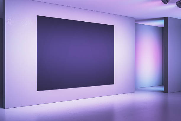 istock Modern exhibition space with blank purple canvas on gallery wall. 3D Rendering 2205348691