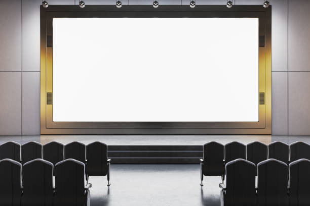 istock Modern cinema theater with large blank screen and empty seats. 3D Rendering 2205348784