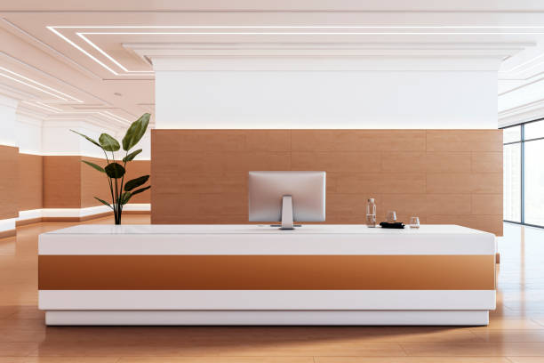 istock Modern reception desk in office lobby with wooden accents and computer. 3D Rendering 2205348838